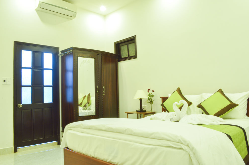 Halo Homestay Хойан Экстерьер фото