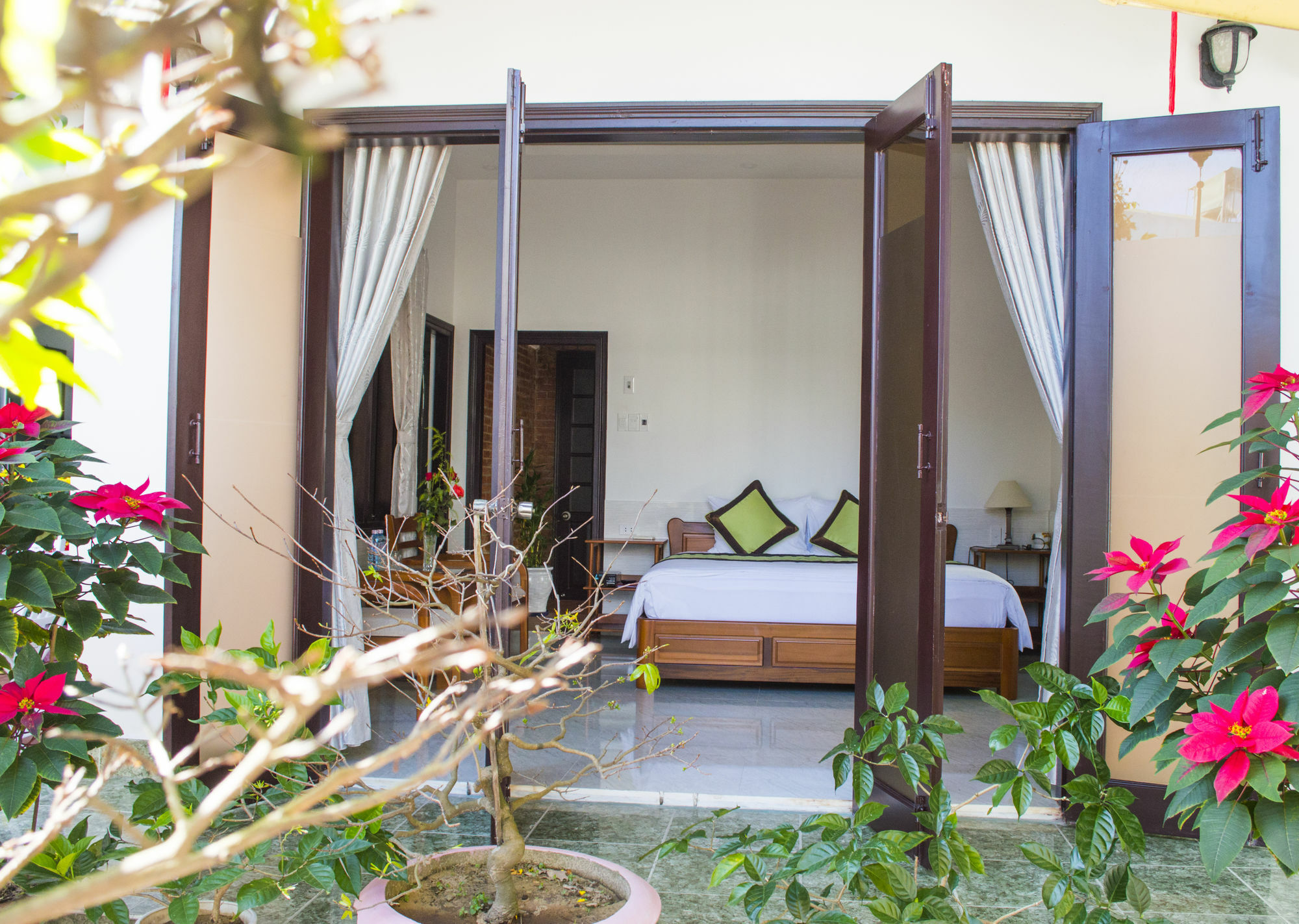 Halo Homestay Хойан Экстерьер фото